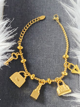 Cargar imagen en el visor de la galería, Bracelet doré en acier inoxydable – plaqué or 18 carats avec pendentifs
